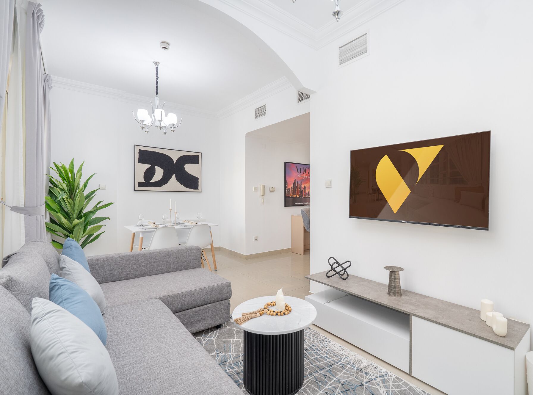 Luxury Apartment, City View | Living area | 55-inch Smart TV with satellite channels