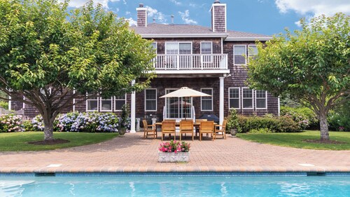 Stately traditional home with open floorplan and private pool in coveted...