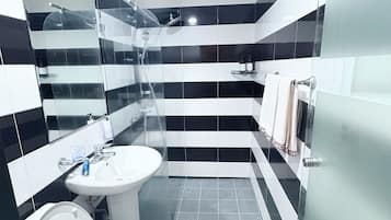 Deluxe Double Room, City View | Bathroom | Shower, free toiletries, hair dryer, towels