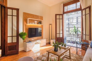 Deluxe Apartment, City View | Living area | Flat-screen TV - UPOINT Floors (Buenos Aires)