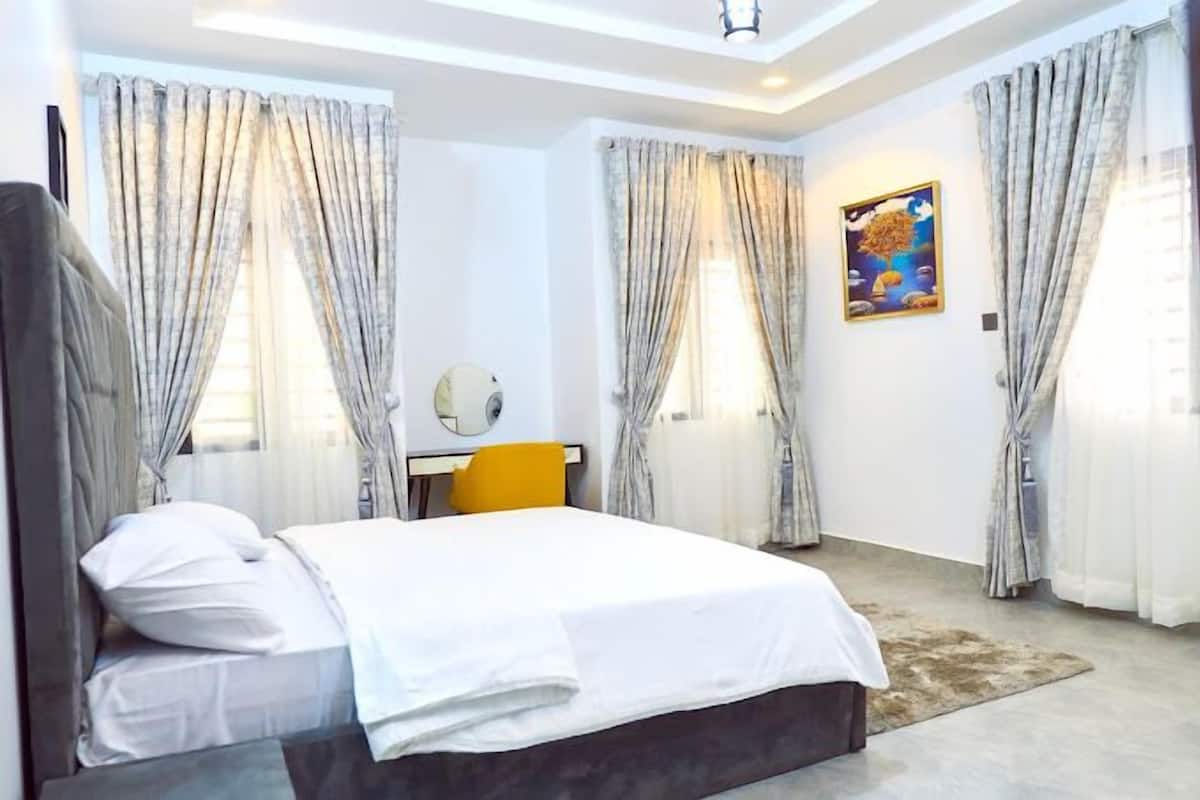 Deluxe Room, Balcony, City View | Desk, laptop workspace, blackout curtains, soundproofing
