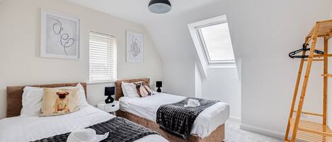 4 bedrooms, desk, iron/ironing board, travel cot