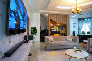 Deluxe Apartment, Balcony, City View | Living area