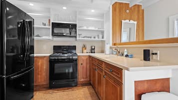 Apartment, 1 Queen Bed, Patio, Ocean View (The Old Apartment) | Private kitchen | Fridge, microwave, oven, stovetop