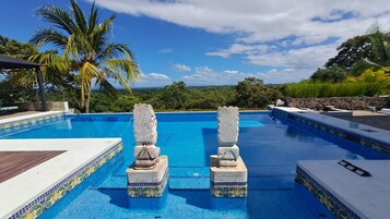 Outdoor pool, open 8:00 AM to 9:00 PM, free cabanas, sun loungers