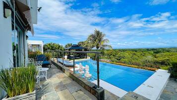 Outdoor pool, open 8:00 AM to 9:00 PM, free cabanas, sun loungers