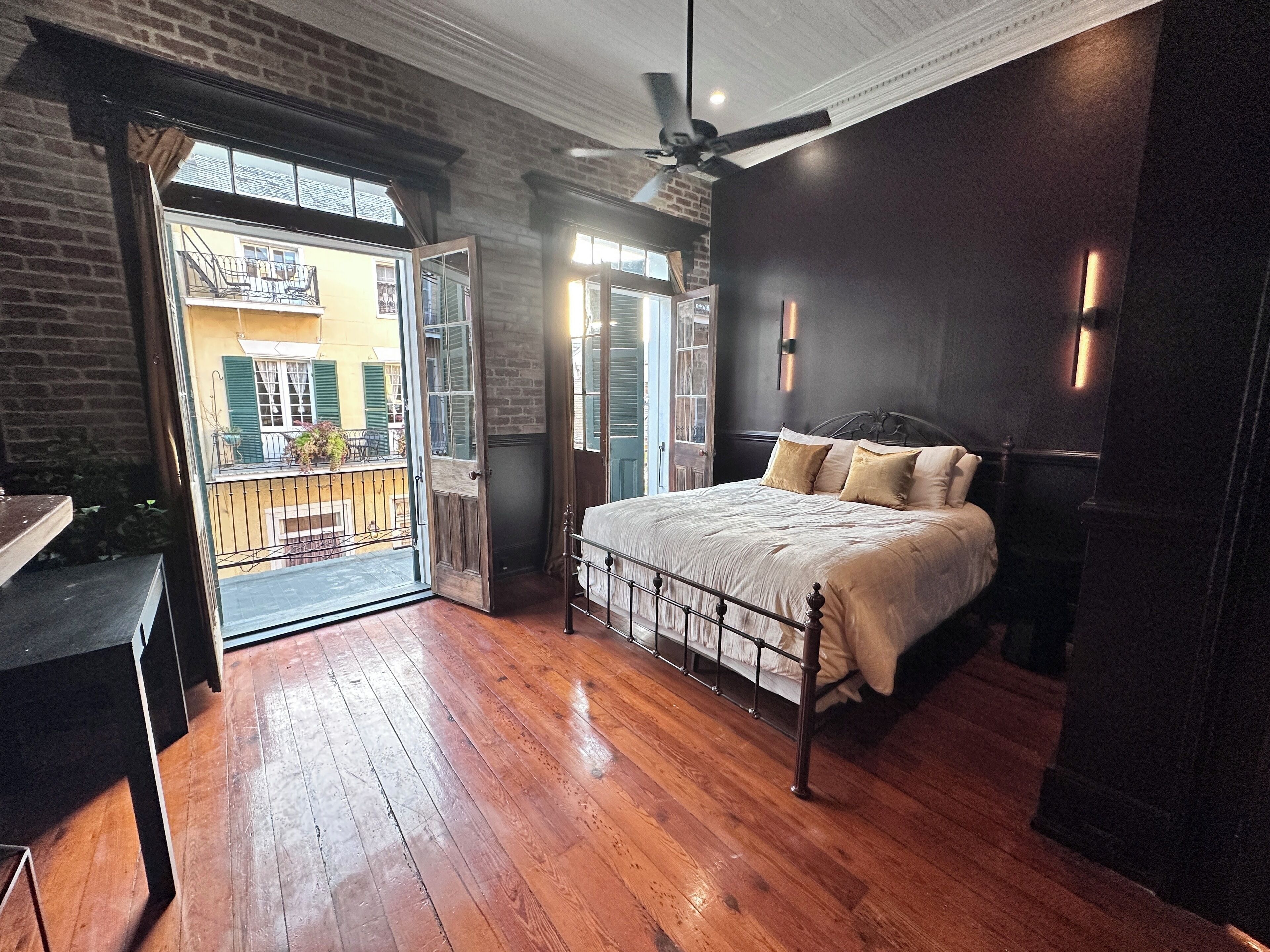 1 bedroom, desk, iron/ironing board, travel crib