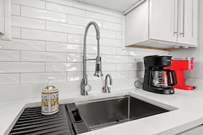 Fridge, microwave, oven, stovetop - Serenity By The Sea: Modern Beachfront Condo with Stunning Views (Murrells Inlet)