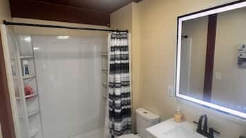 Hair dryer, towels, soap, shampoo