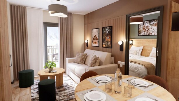 A modern hotel room with a sofa, dining table set for two, and a bed with a wooden headboard. - Wifi, ski-in/ski-out & foot of the slopes, fitness, swimming pool, balcony, parking, tv, ski locker (Vars)