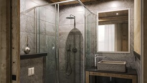 A modern bathroom with a glass-enclosed shower, a wooden vanity, and a large mirror. - Chalet, wifi, 300m from resort center, sauna, terrace, fireplace or stove, parking, tv, ski locker (Les Deux Alpes)