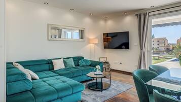 Deluxe Villa, Sea View | Living area | LED TV