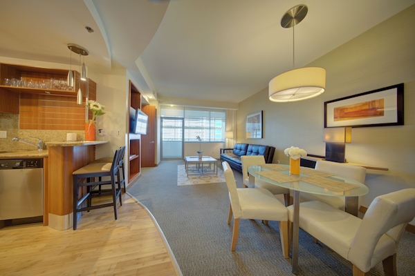 Deluxe Apartment, Balcony | Living area | 34-inch TV with cable channels