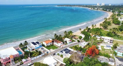Hear the Waves | Luquillo Stay Walking Distance to the Beach, Nearby Rainforest & Ferry Access