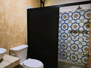 Shower, towels, soap, toilet paper