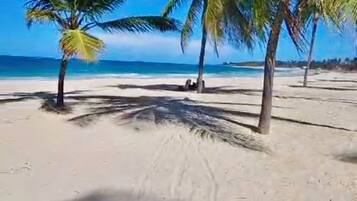 Beach nearby, sun loungers, beach towels