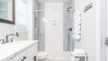 Hair dryer, towels, soap, shampoo