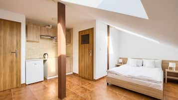 Classic Quadruple Room | Desk, blackout drapes, iron/ironing board, free WiFi