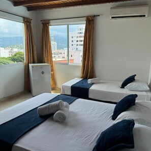 Minibar, wifi gratis y ropa de cama