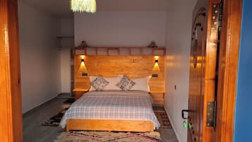 Bungalow Deluxe, varias camas, vista parcial al océano | Camas Tempur-Pedic y artículos del minibar gratis