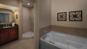 Jetted bath, hair dryer, towels, soap