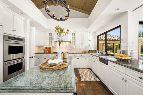 Luxury 5-bedroom OC estate with US Open surface tennis court near Disneyland