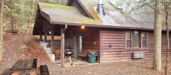 Adventurer's  Lodge, a charming 3-bedroom cabin with WiFi in quiet Lansing, WV.