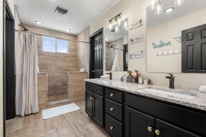 Shower, towels, soap, toilet paper