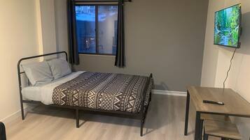 1 habitación, tabla de planchar con plancha, wifi y ropa de cama