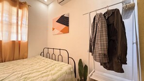 1 habitación, tabla de planchar con plancha, wifi y ropa de cama 