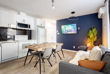 Foto von Warm 2BR in the Heart of Plateau MTL