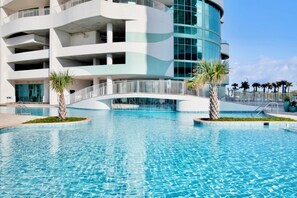 Indoor pool, a heated pool - Turquoise Place D1008 | Gorgeous Updates! Oversized, hot tub/grill on deck, huge slide for kids! (Orange Beach)