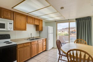 Family Suite, Patio, Mountain View | Private kitchen | Mini-fridge, microwave