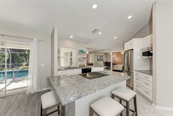 Fridge, microwave, oven, stovetop - Oasis on Nightingale: Screened Pool & Near Beach (Venice)