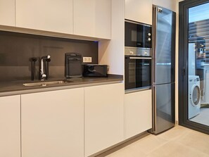 Fridge, microwave, oven, dishwasher