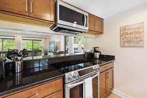 Fridge, microwave, oven, stovetop - Lakefront Pinehurst Condo 2BD/2BA - 237 - With Community Pool Access (Pinehurst)