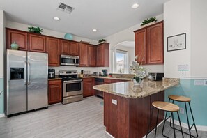 Fridge, microwave, oven, stovetop - The Caste at Windsor Hills | 6 bed, 4 bath | Games Room | Private Pool (Kissimmee)