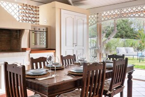 Dining - Villa Junco is located in Villasimius, its privileged position, a few steps from the Porto Giunco ​​beach, makes it an ideal holiday place in which to stay.To complete the comfort and luxury features, the villa has a swimming pool for exclusive use,  (Notteri)