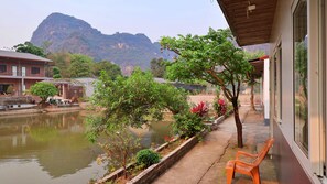 Quadruple Room, Mountain View, Lakeside | Minibar, desk, laptop workspace, soundproofing - Trang An Pristine View Homestay (Hoa Lu)