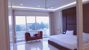Luxury Suite, Balcony, Garden View | 1 bedroom, desk, blackout drapes, iron/ironing board