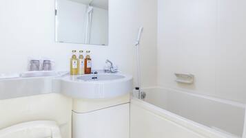 Combined shower/bathtub, hair dryer, bathrobes, slippers