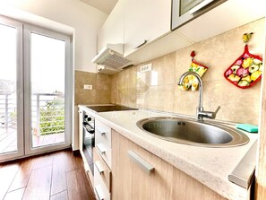 Apartment (One-Bedroom Apartment (1.kat)) | Private kitchen | Fridge