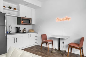 Fridge, microwave, stovetop, coffee/tea maker