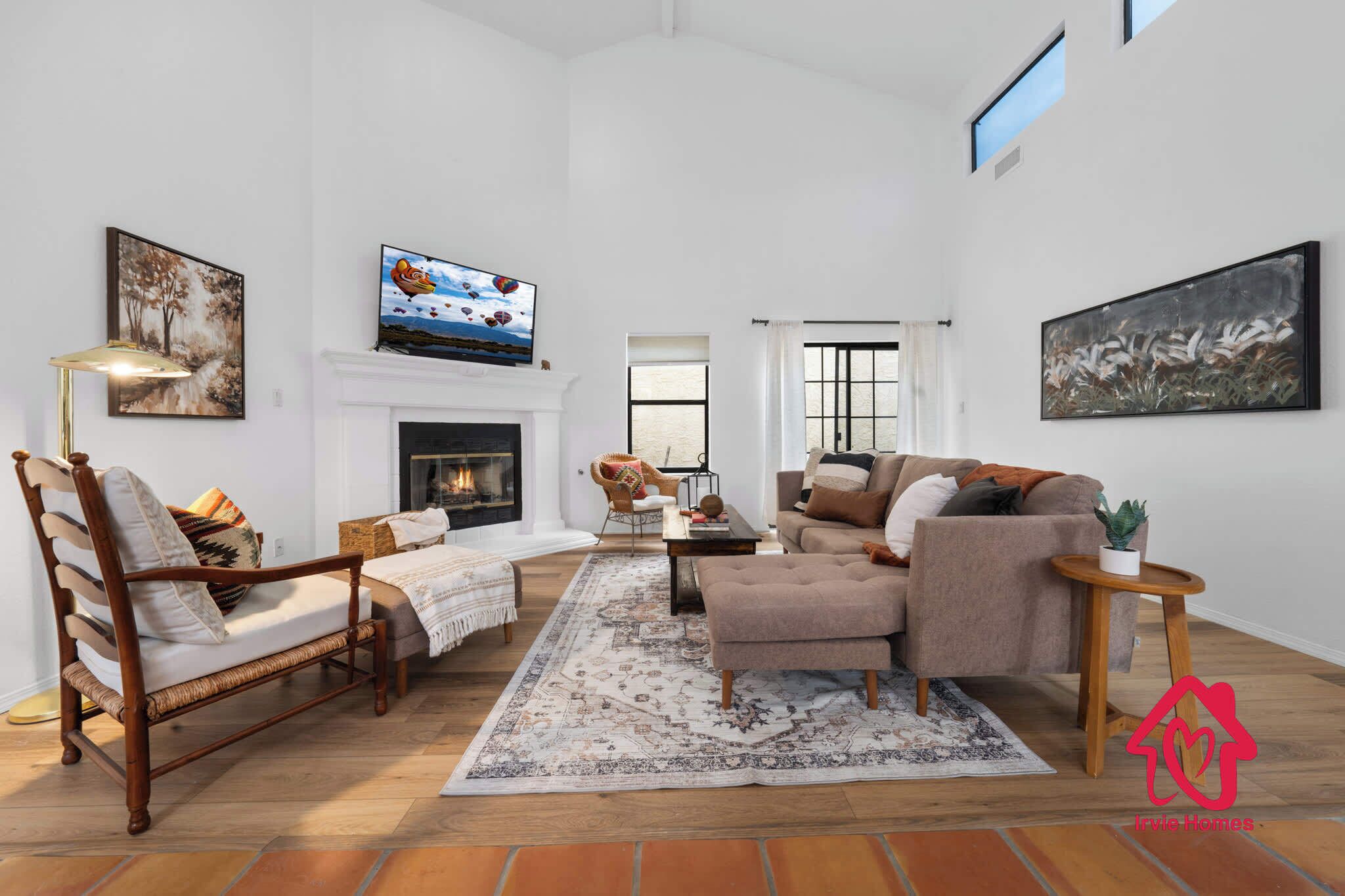 TV, fireplace, books, offices