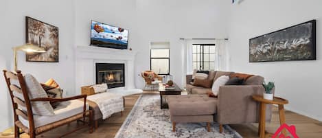 TV, fireplace, books, offices