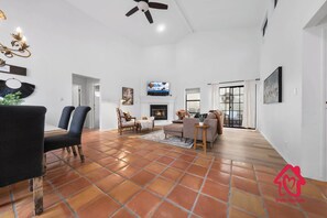 TV, fireplace, books, offices