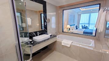 Suite | Bathroom | Free toiletries, slippers, towels
