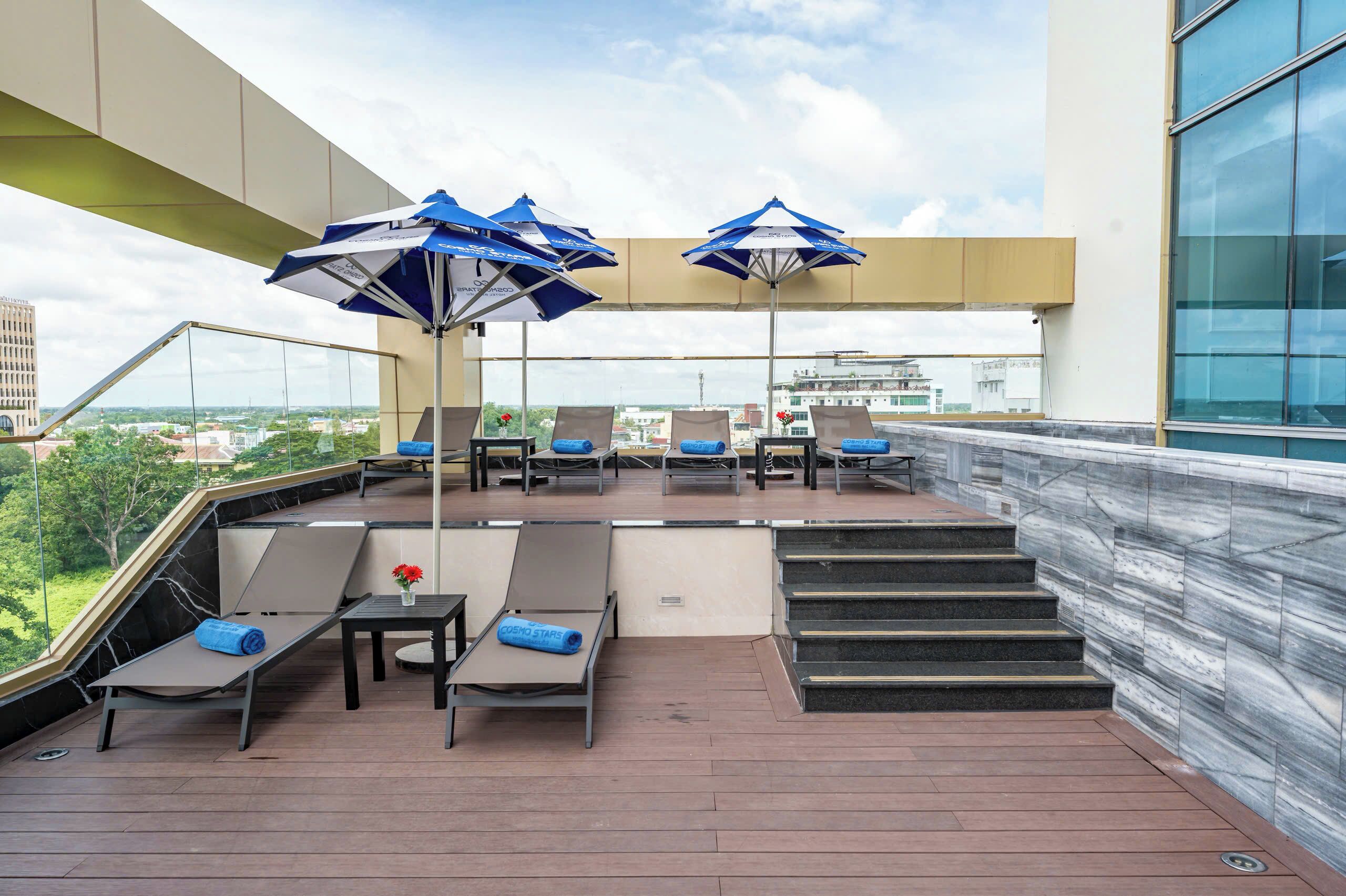 Outdoor pool, open 7:00 AM to 7:00 PM, pool umbrellas, sun loungers