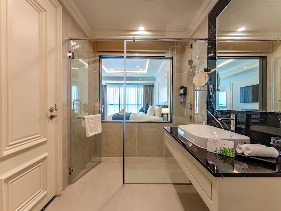 Deluxe King Bed | Bathroom | Free toiletries, hair dryer, bathrobes, slippers