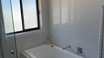 Shower, towels, toilet paper